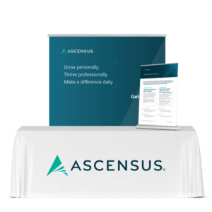 An exhibit table with backdrop and tabletop banner.